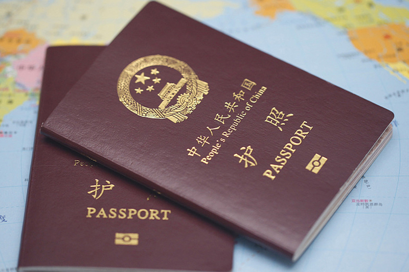  الصين تستأنف إصدار جوازات السفر لمواطنيها